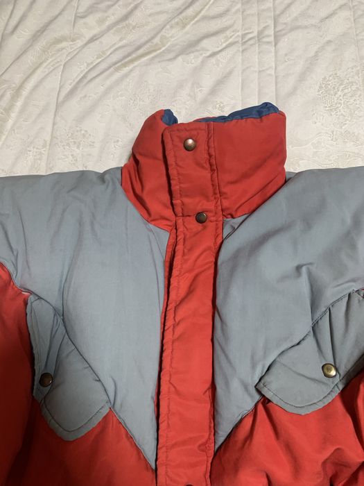 Kispo de penas de cor azul