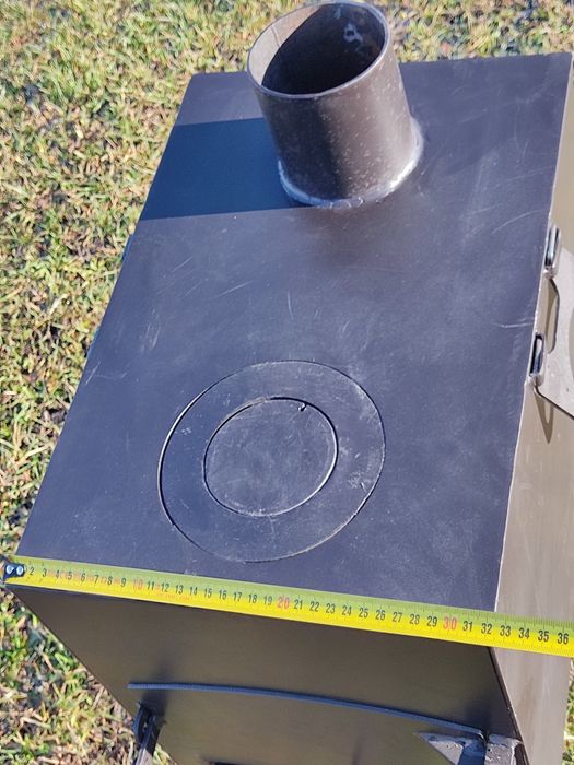 Буржуйка.з варочною поверхею.топка.кухня польова.печь.печка.пічка.камі