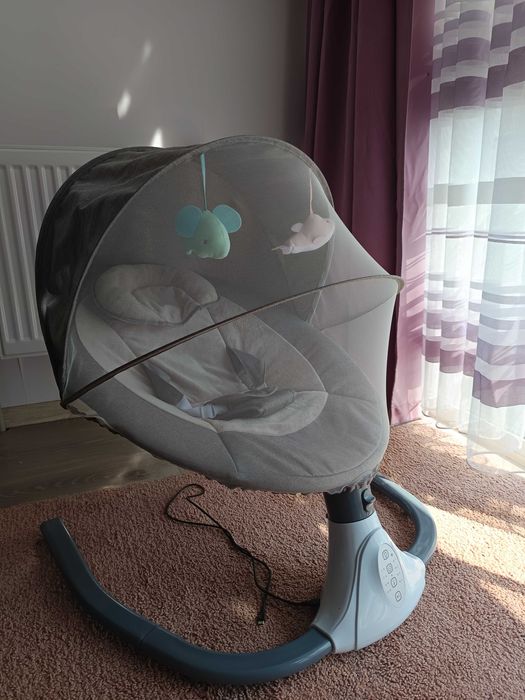 Дитяча електрична гойдалка