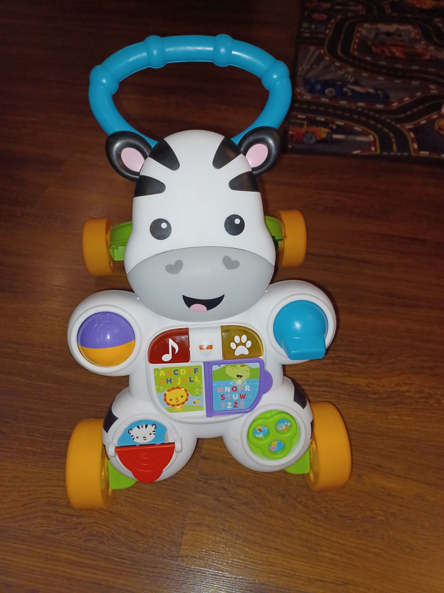 Chodzik pchacz Fisher price