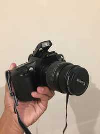 Máquina fotográfica Canon EOS3000 Reflex