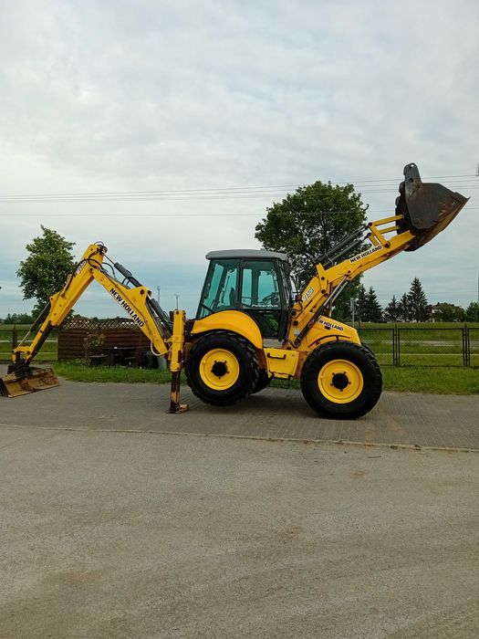 Koparko-ładowarka New Holland B115 cena Brutto 5500 mtg nie case jcb