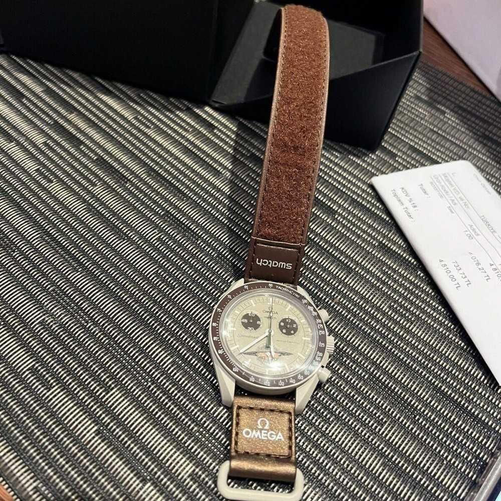 SO33T100 Biocéramique Saturn – Omega x Swatch