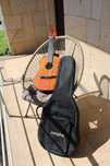 Guitarra acústica semi-nova 3/4 + mochila de proteção