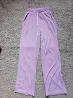 фіолетові брюки штани
