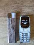 Mini telefon , mniejszy od zapalniczki