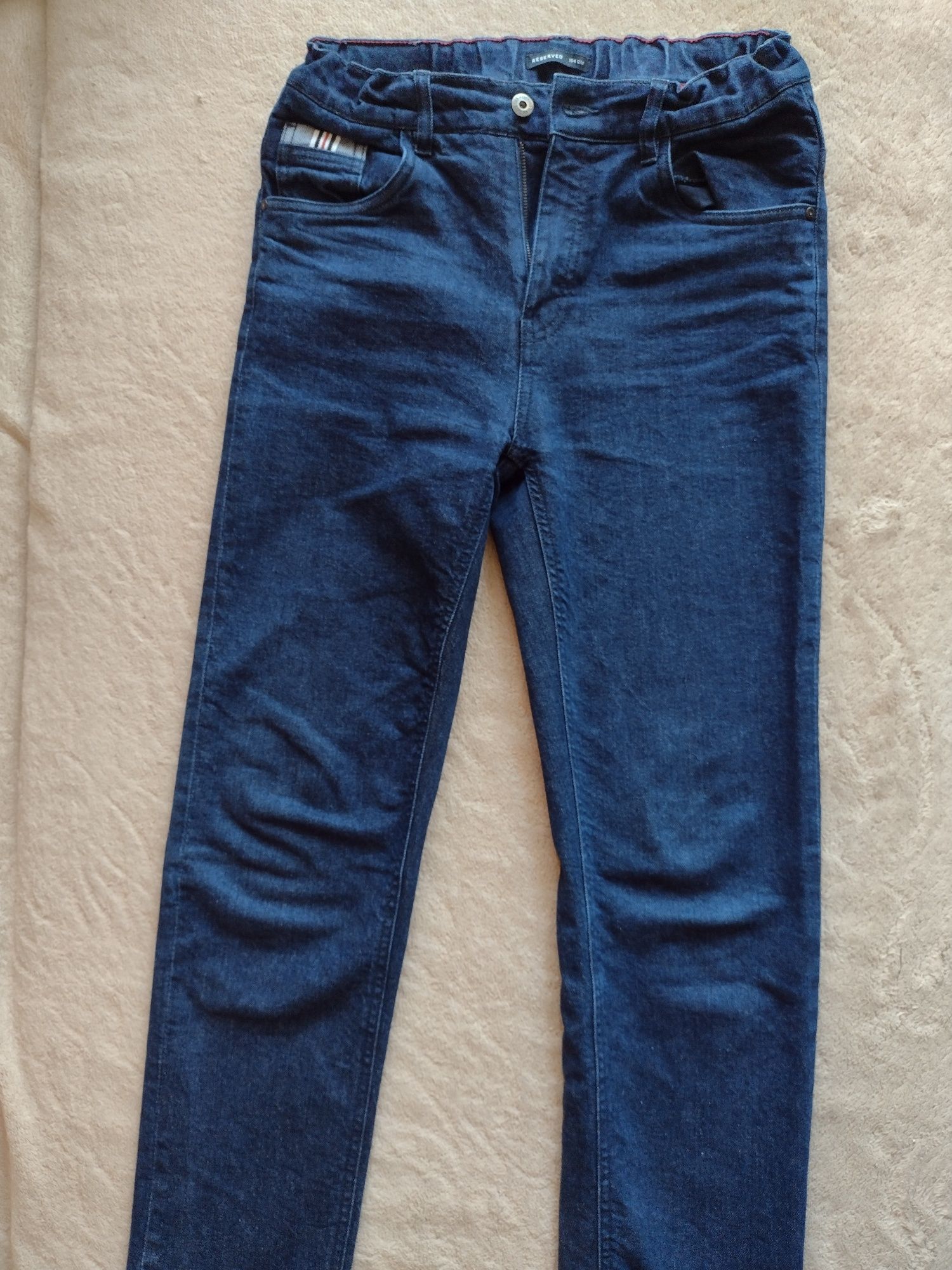 Spodnie jeansowe Reserved dla chłopca rozmiar 164 cm