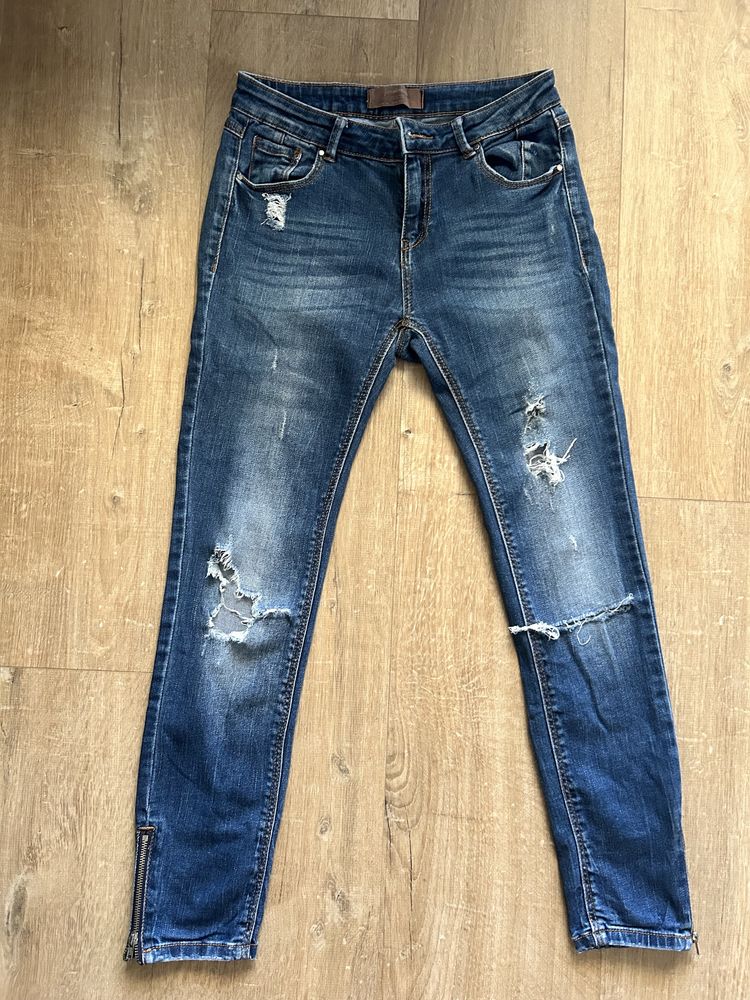 Spodnie jeansy XS 34 Stradivarius duże dziury ZIP Zamki