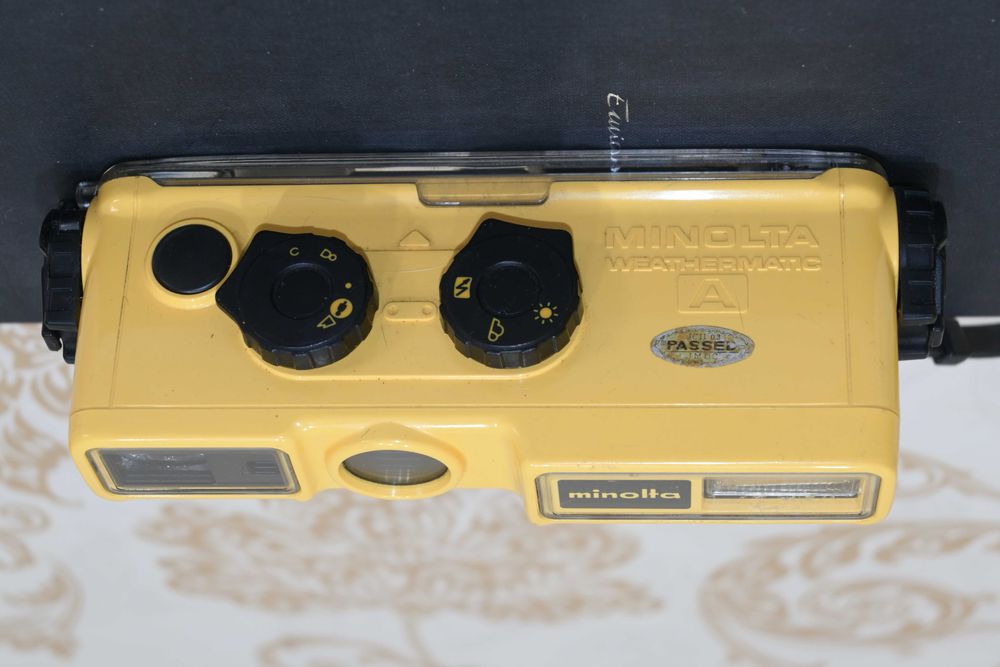 Máquina de coleção Minolta Weathermatic