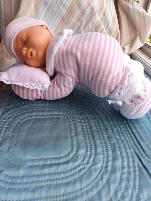 Сплячий музичний пупс