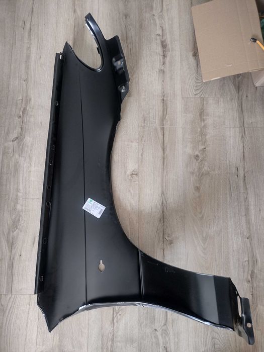 Błotnik przedni lewy Opel Astra F - nowy