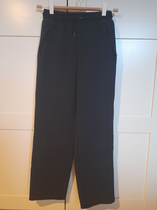 KIK spodnie dresowe r.146/152