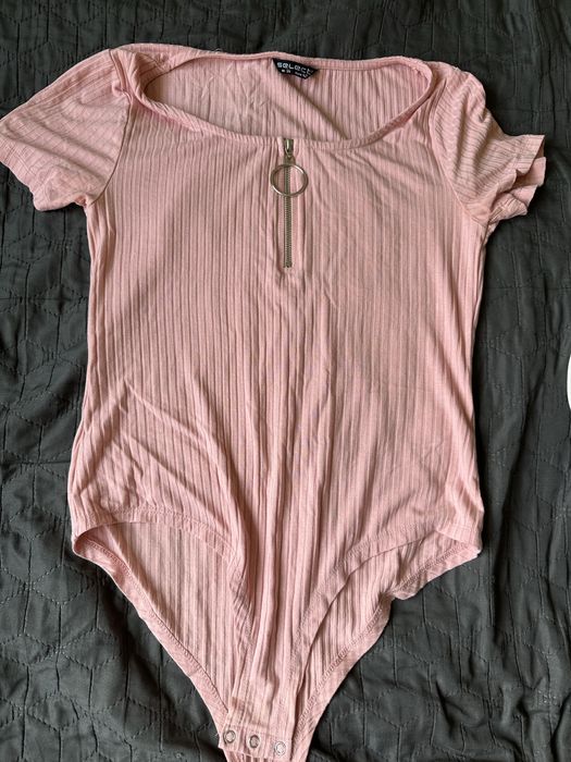 Боді жіноче стан гврний колір пудра з замочком .