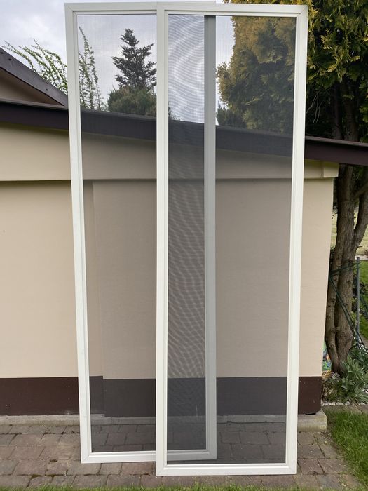 Moskitiera drzwiowa przesuwna 250x78 cm dwuskrzydlowa uzywana