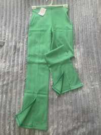 Штани зеленого кольору