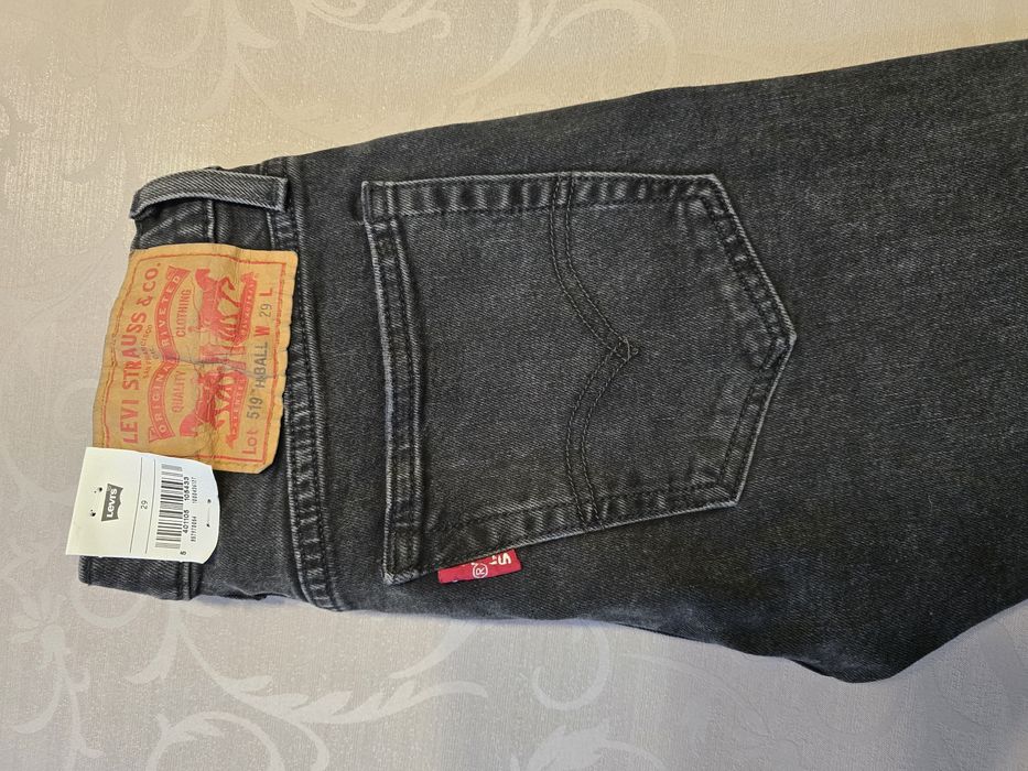 Nowe spodnie Levisy 519 unisex W29 czarne