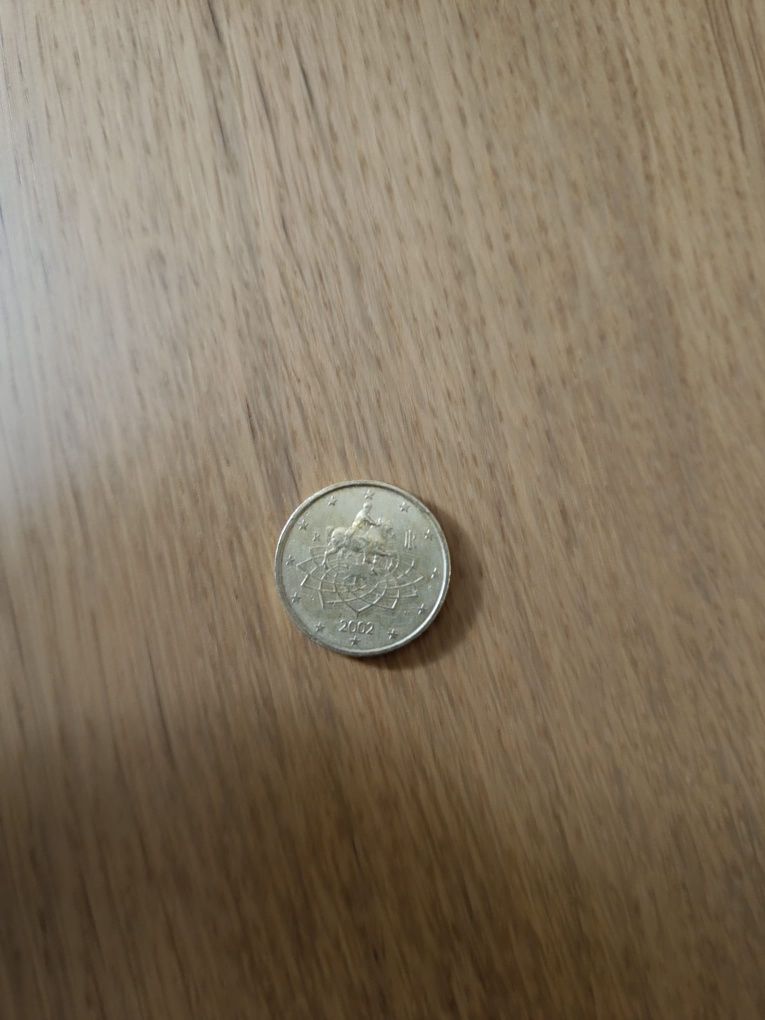 Moedas de 2002 de 1€ da Eslováquia e de 2009 de 0,50€ da Itália
