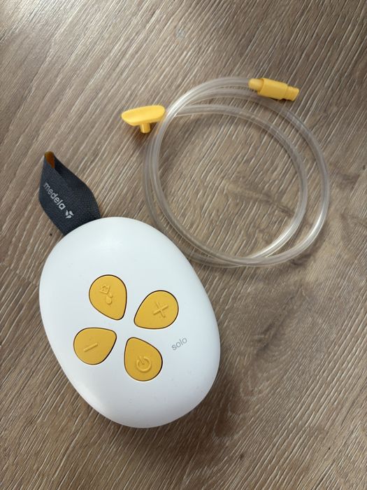 Laktator elektryczny Medela Solo Hands-free + dodatkowe wkładki