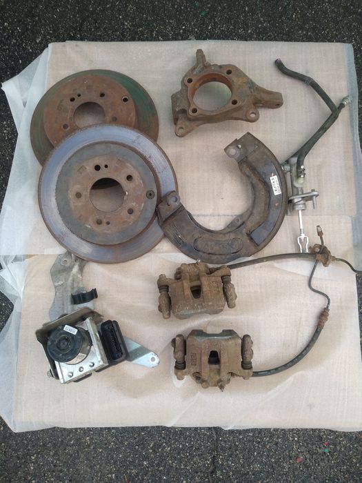 Тормозні диски тросик  супорт блок ABS Mitsubishi Grandis Outlander