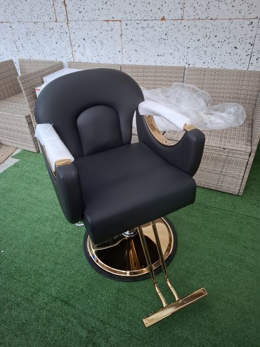 Fotel fryzjerski hydrauliczny z podnóżkiem   53 - 64 cm 180 kg czarny
