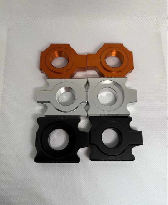 Блок регулювання натяжника для ланцюга