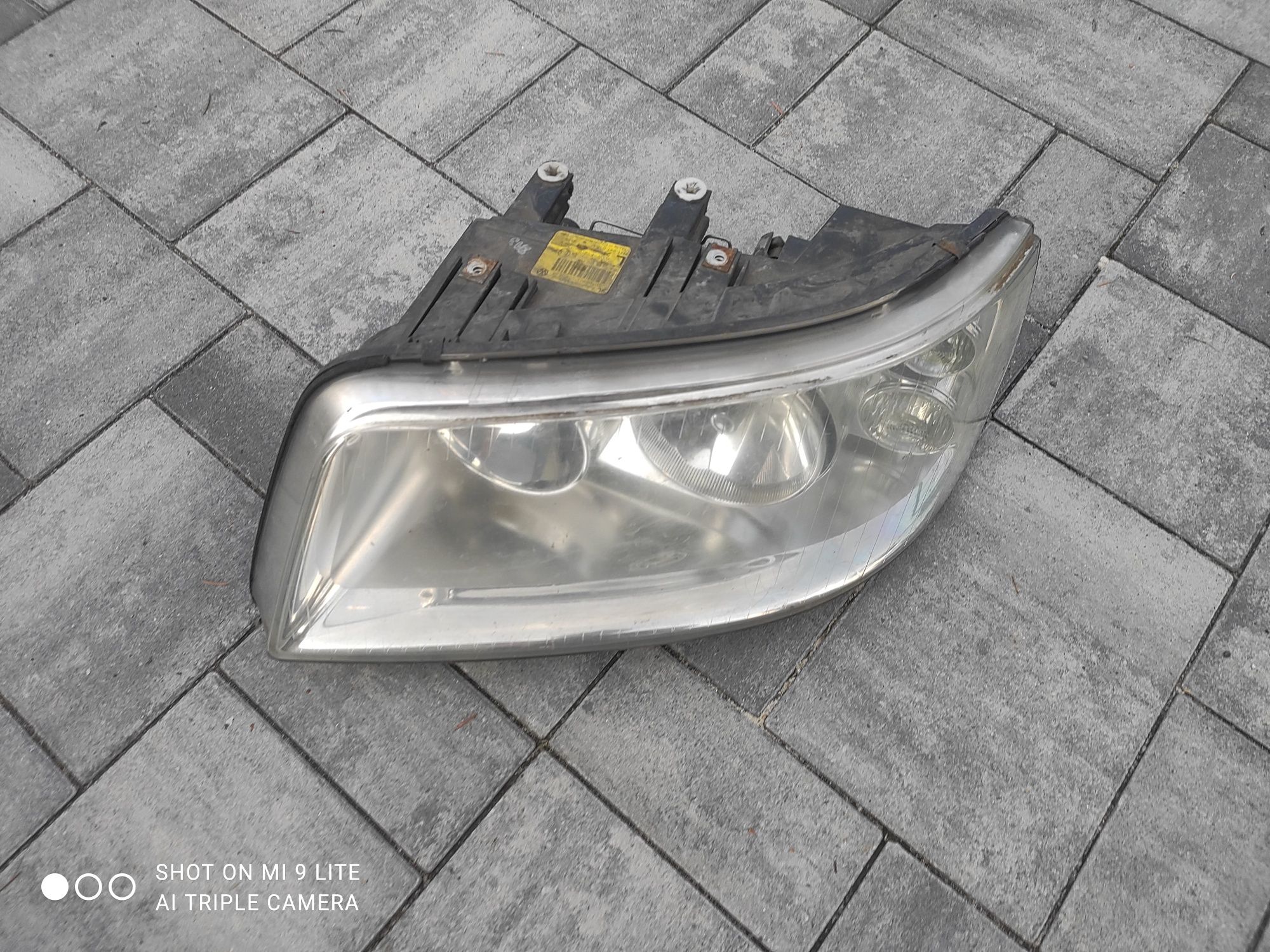 Lampa reflektor przedni przód Volkswagen Transporter T5 Oryginał Europ