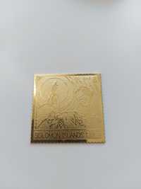 Selo banhado a ouro alusivo à visita do Papa João Paulo II a Fátima
