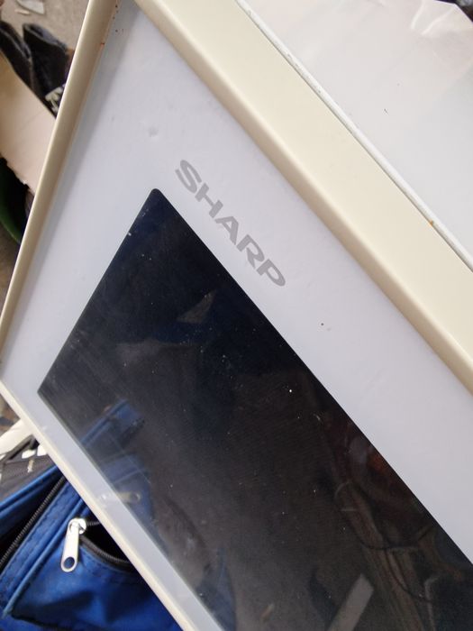 Kuchenka Mikrofalowa z grillem Sharp stan bdb