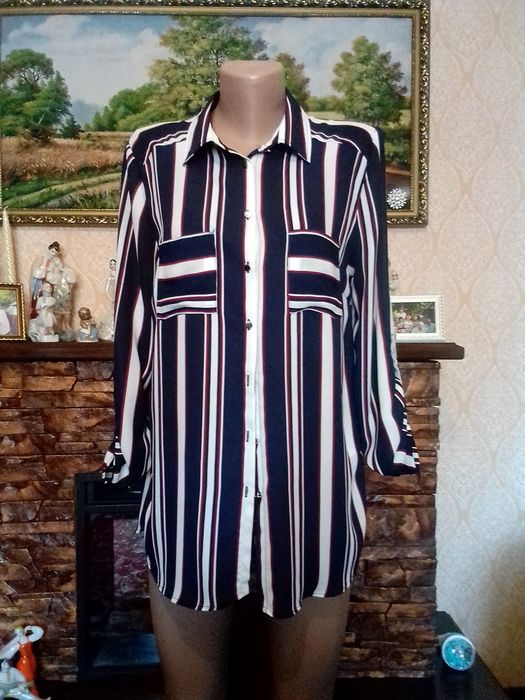 Женские платья, блузки.