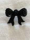 Anel preto com brilhantes