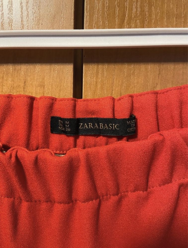 Czerwona rozkloszowana spódnica Zara z kieszeniami rozm. M 38