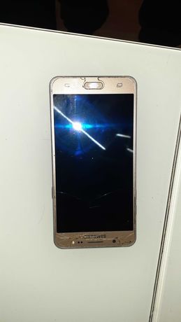 Продам мобильный Samsung J510 на запчасти