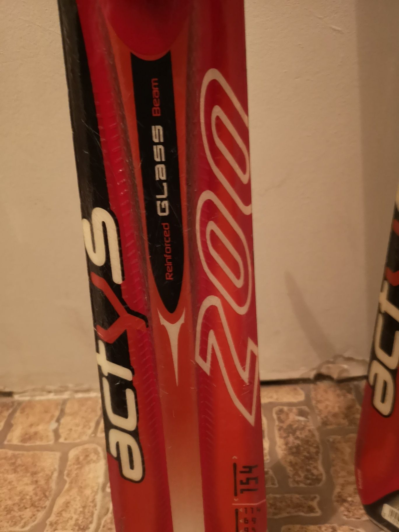 Narty ROSSIGNOL Actys 200 Sport + wiązania ROSSIGNOL 100 + kijki