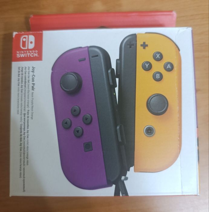 Продам Joy-Con Neon Purple/Neon Orange + Зарядна станція Dobe TNS-875