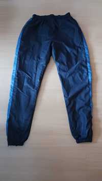 Spodnie dresowe ortalion Lacoste rozmiar 38