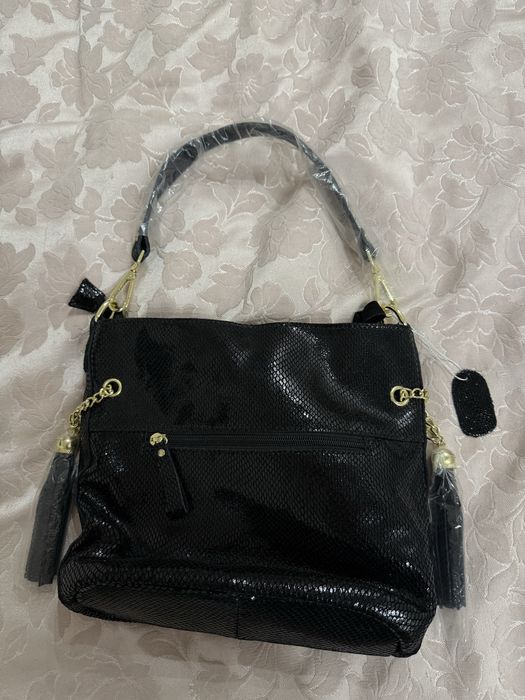 Жіноча шкіряна сумка з лазерним напиленням