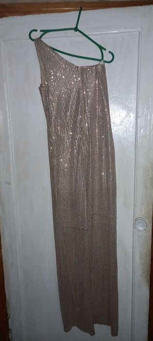 Золотий сіяючий комбтнезон