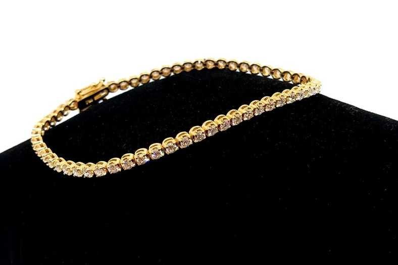 Złota bransoletka tenisówka z diamentami 1,18ct Pr.585 W:5,14gr 18cm