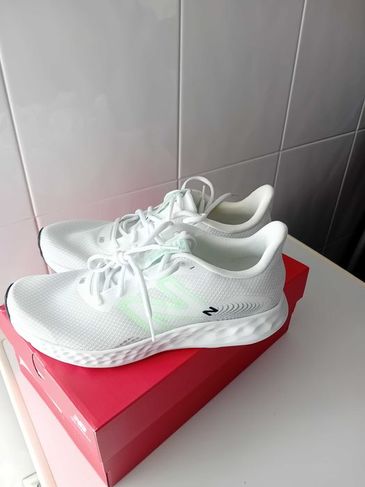 Ténis New Balance com 5 Km Utilização