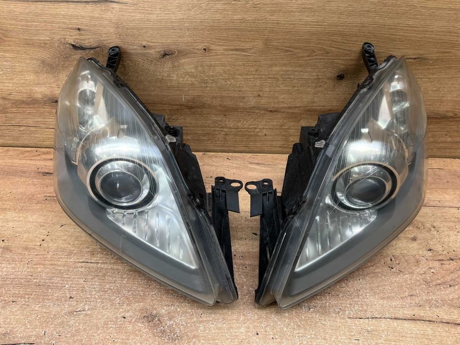 Lampa/reflektor przedni lewy prawy Opel Zafira B Bi-Xenon