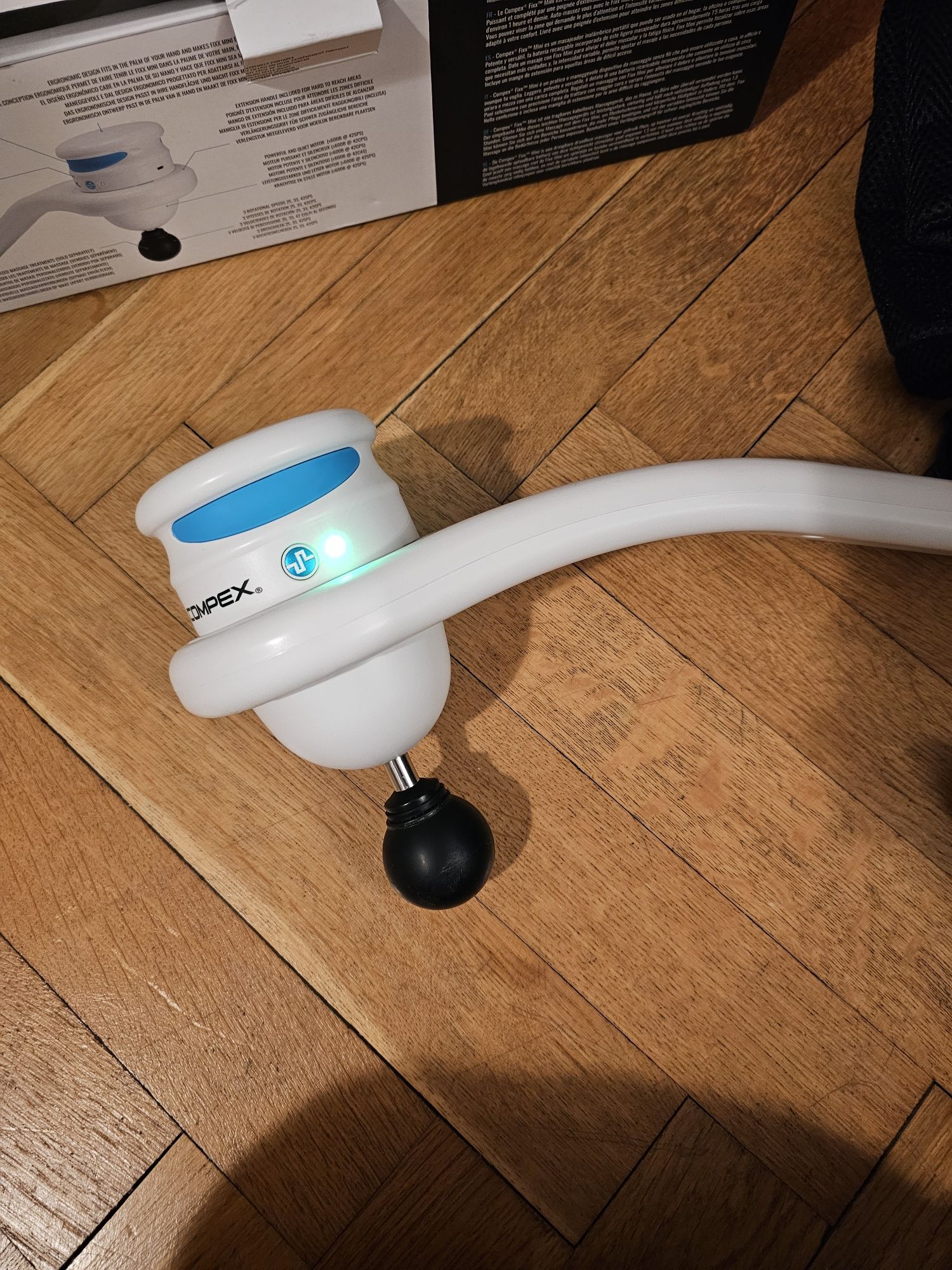 Compex Fixx Mini Stymulator mięśni biały Masażer Pistolet Ultra Fix