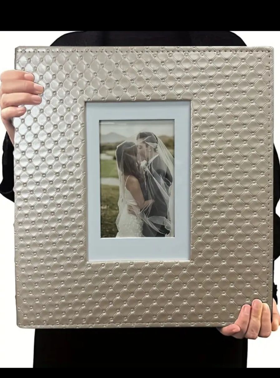 Новий фотоальбом34см*35см, вміщує 600 фотографій 10*15