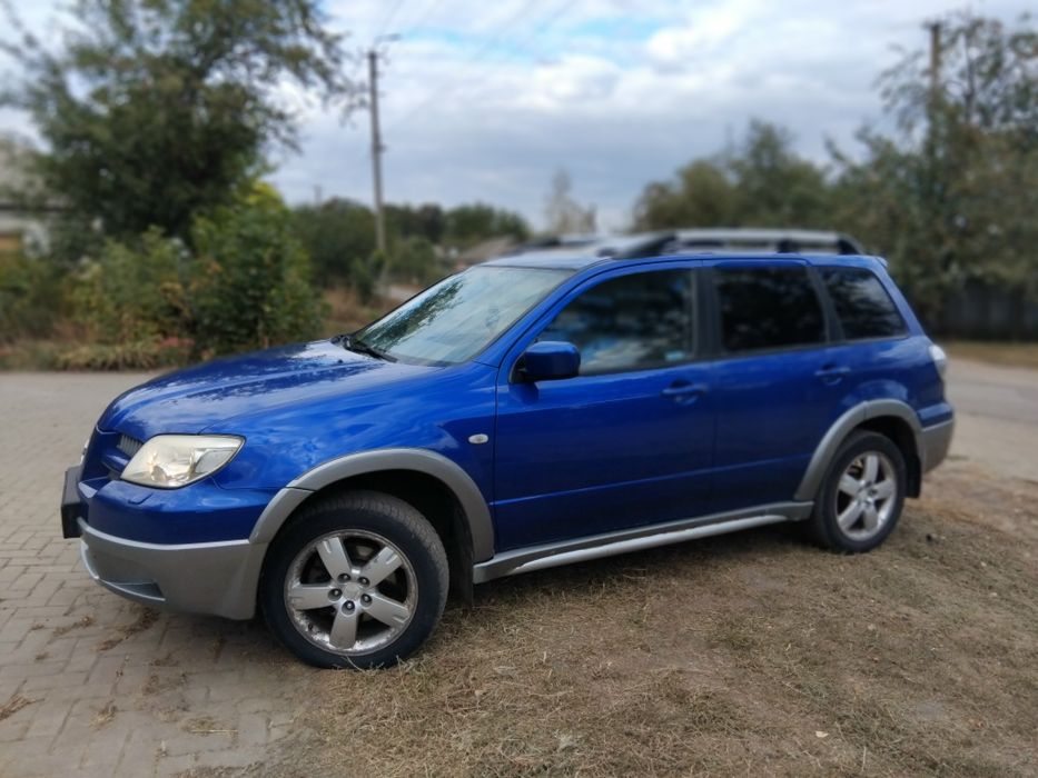 Mitsubishi outlander 2.4 газ/бензин автомат полный привод