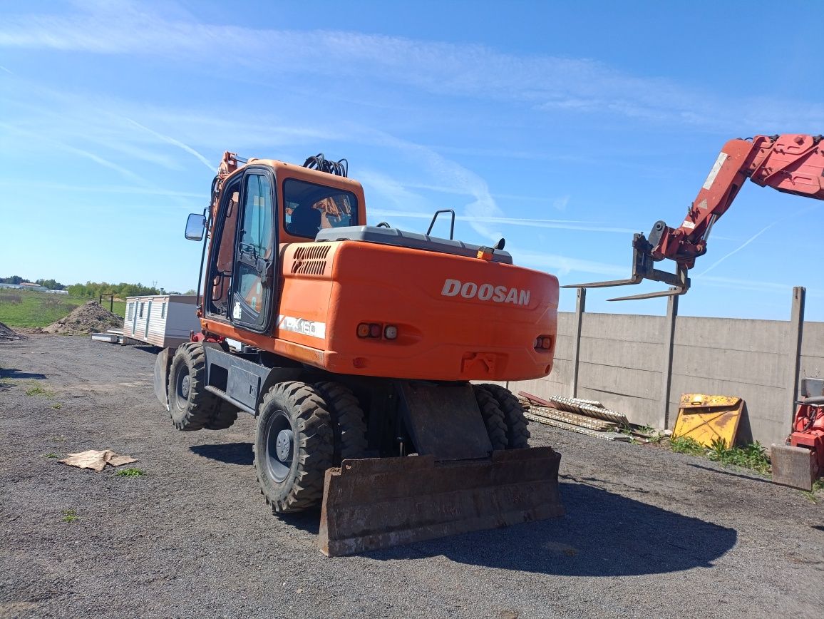 Koparka kołowa doosan 160 jak cat atlas doosan 140