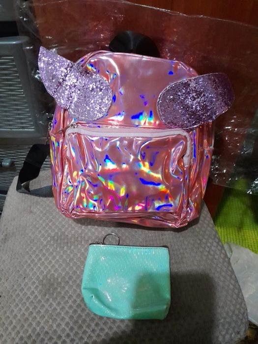 Продам новий рюкзак,подарунок гаманець!