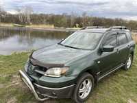 Mitsubishi Outlander  Митсубиси Аутлендер 2004  2.4 газ/бензин