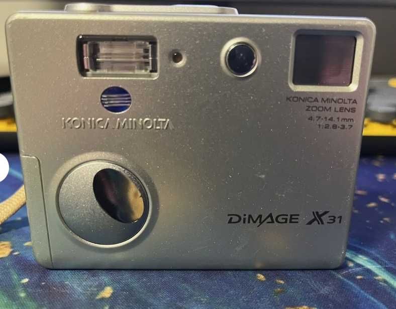 Фотоопарат Konica Minolta DiMAGE X31 был куплен недавно в Германии