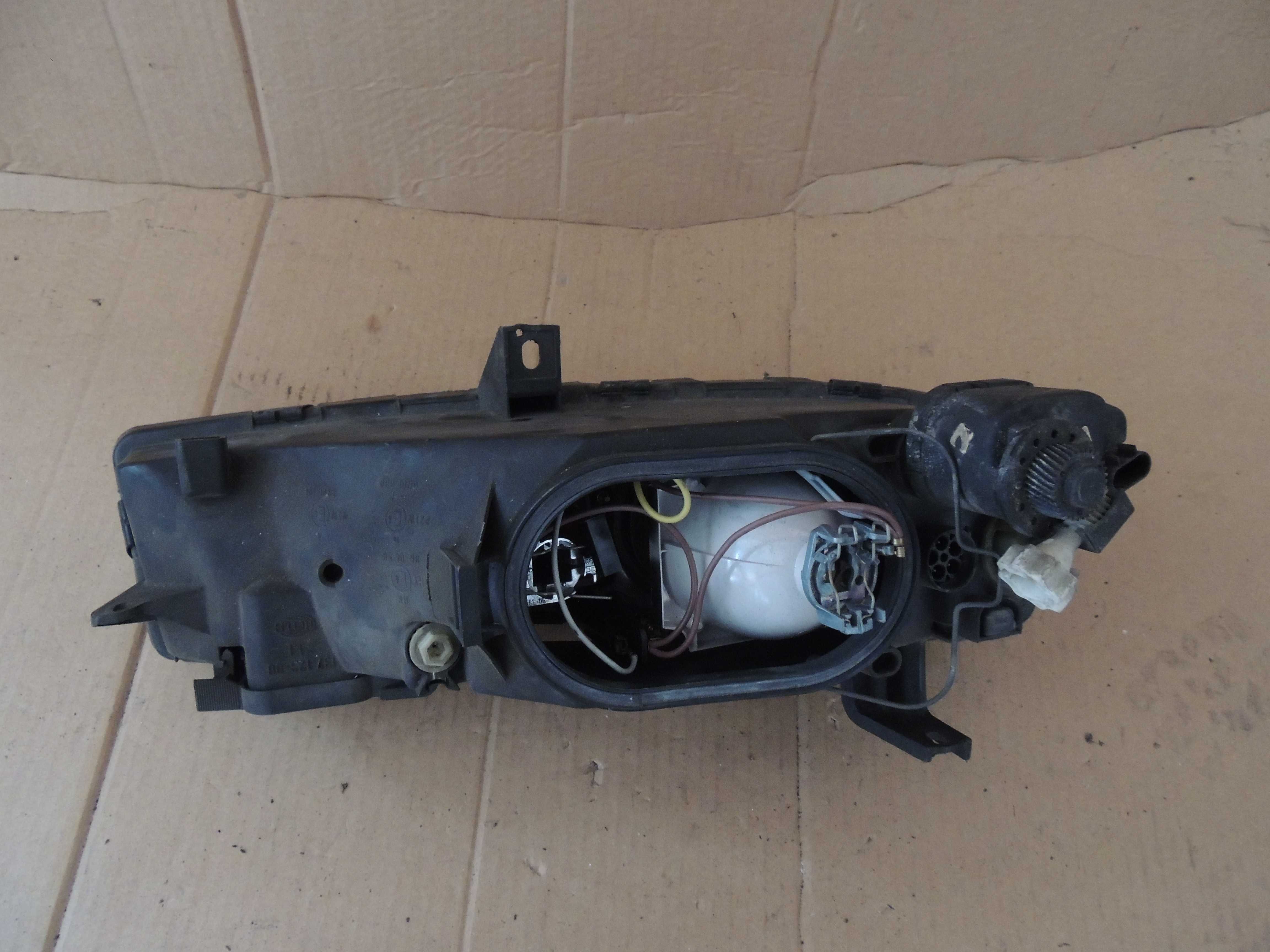 Lampa przednia lewa europejska Opel Calibra 89,90,91,92,93,94,95,96,97