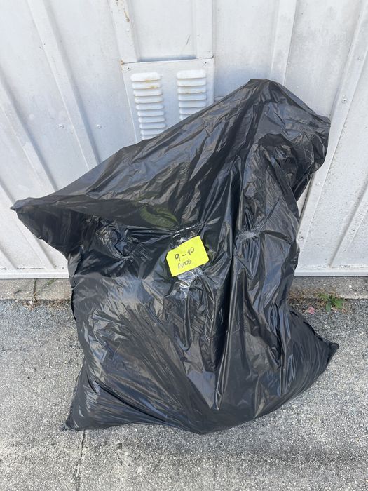 Saco de 100L de roupa menina 9-10 anos