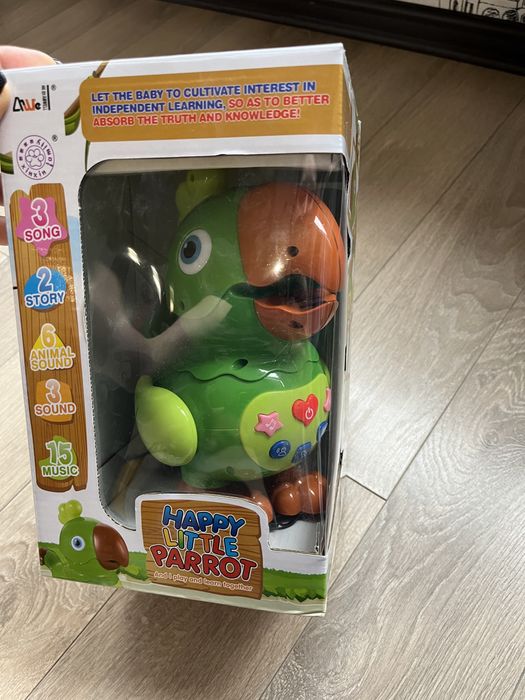 Інтерактивна іграшка папуга